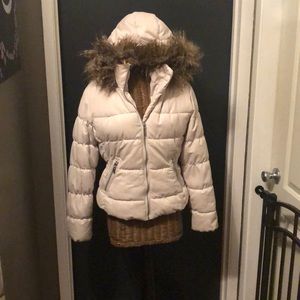 Warm puffy jacket with fur hood